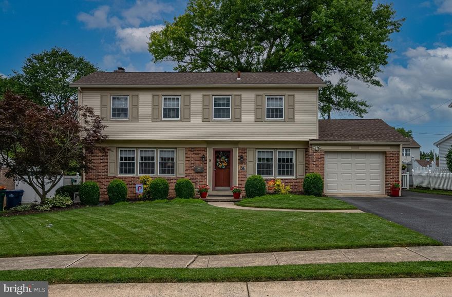 Chic Center-Hall Split in Wilson Schools with 4 bedrooms and 2 family rooms! This 5-floor home is nestled on a quiet cul-de-sac in the coveted Drexelwood neighborhood. It's a beautifully maintained center-hall split offering 4 bedrooms, 2.5 baths and nearly 2,400 sq ft of living space.  The biggest thing you'll notice both inside and out is that it is immaculately maintained. Step inside to a slate-tiled foyer and gleaming hardwood floors that flow past a dramatic center staircase into an open living room and dining room — ideal for both everyday living and entertaining.  The stunning kitchen, remodeled in 2016, features crisp white cabinetry, quartz countertops, stainless-steel appliances and a tasteful tile backsplash. Just off the kitchen, an inviting family room showcases a floor to ceiling brick fireplace and sliders to a bright three-season sunroom, creating a seamless indoor-outdoor vibe.  Upstairs, your primary suite is a true retreat, boasting a renovated en suite bath with custom tile work, glass-enclosed shower and granite surfaces.  Three additional bedrooms—each with hardwood or plush new carpeting—offer plenty of space for family, guests or a home office.  The fully finished basement provides yet another gathering spot, complete with a rec room, half-bath and abundant storage. This includes a dedicated laundry/storage room.  Outside, unwind with your morning coffee or host summer barbecues on the expansive Trex-type deck overlooking a low-maintenance, fully fenced yard with shed. Practical updates include a new roof (2016), newer central air conditioning, newer economical gas heat and a new softener. There is an attached one-car garage with newer door, plus additional parking area.  All this in a walkable neighborhood just moments from shopping, dining, entertainment and major highways.  Don’t miss your chance to make 9 Kevin Court your new address—schedule your private tour today!