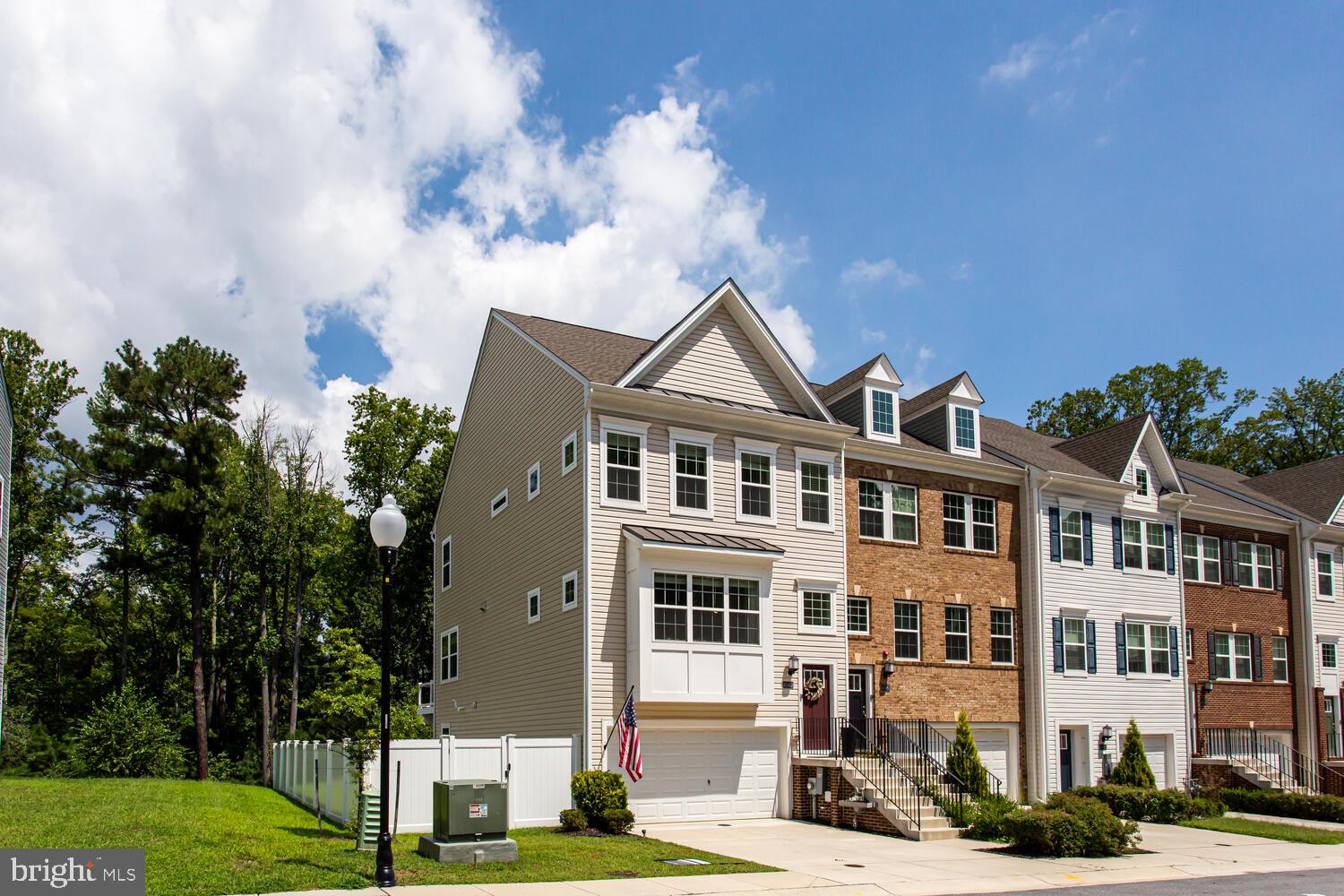 This is a beautiful 4BR, 3.5BA End-Unit Townhome in The Woods at Myrtle Point! This three-level home offers over 2,400 sq. ft. of living space in a private setting that backs to trees, while still being minutes from shopping, dining, and NAS Pax River.
The main level is perfect for both daily living and entertaining, featuring an open-concept living and dining area anchored by a stunning gourmet kitchen. Enjoy a massive center island with seating, stainless steel appliances, a walk-in pantry, and a stylish bar area—ideal for coffee in the morning or hosting with friends. From the dining area, step out to a large deck where you can relax, entertain, or simply take in the peaceful wooded views. Upstairs, the spacious primary suite feels like a retreat with its oversized walk-in closet and spa-inspired bathroom complete with dual sinks and a tiled shower. Two additional bedrooms, a full bath, and a laundry room with washer and dryer round out the upper level. The lower level offers incredible flexibility with a fourth bedroom or rec room, a full bath, and walk-out access to the fully fenced backyard—perfect for pets, play, or quiet evenings outdoors. Additional features include a two-car garage, tankless water heater, and multiple storage closets.
Residents of The Woods at Myrtle Point enjoy exceptional community amenities, including a pool, clubhouse, and playgrounds. The location offers an easy commute via Route 4 and close proximity to Little Proteges Early Learning Center and Myrtle Point Park with two miles of shoreline and over seven miles of hiking trails.
This home combines style, space, and an unbeatable location—schedule your tour today!