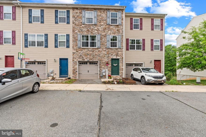 Welcome to 128 Ben Blvd, a spacious interior row townhome offering 4 bedrooms, 3 full baths, and 1 half bath in a quiet, well-maintained neighborhood. Conveniently located just minutes from the Delaware line and major highways, this home is perfect for commuters. Built only 12 years ago, it offers modern comfort and a smart layout. 
Enjoy the privacy of a backyard surrounded by trees, and take advantage of the rare 1-car garage with two extra spaces as well as overflow parking available—one of the few townhomes in the area with this feature. The basement provides ample storage or additional living space, and added shelving in the laundry room (2025). A fantastic blend of convenience, space, and updates—only a short drive away from tax free shopping and dining in Newark Delaware.