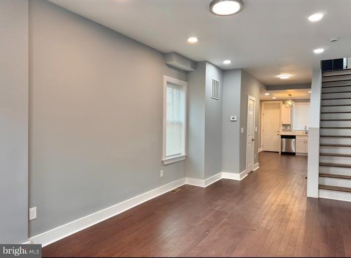Welcome to 725 N Streeper St! This beautifully remodeled corner townhouse features a complete renovation, offering modern elegance and comfort in the heart of Baltimore. Enjoy an abundance of natural light streaming in from multiple angles. With four spacious bedrooms, including three on the second floor and a primary bedroom with a full bathroom, this home is designed for both relaxation and convenience. An additional full bathroom is located in the hallway, and a stylish half bathroom has been added on the first floor, conveniently situated between the kitchen and living room. The finished basement not only provides an extra bedroom but also features an independent entrance from the backyard, offering flexibility for guests or potential rental opportunities. This open space is perfect for any future projects or recreational activities. The brand-new kitchen is a chef's dream, equipped with modern appliances and ample counter space, ideal for cooking and entertaining. This home showcases a complete renovation with new framing, electrical, plumbing, HVAC, gas line, and water heater, ensuring everything is up to date and functioning perfectly. New wood flooring has also been installed throughout the home, adding a touch of elegance and warmth. Large windows throughout allow natural light to flood in, creating a warm and inviting atmosphere. Located in a vibrant neighborhood, you’ll be just minutes away from local parks, shops, and dining options. Don’t miss your chance to own this stunning, move-in-ready home! Schedule your private showing today and experience all that 725 N Streeper St has to offer!