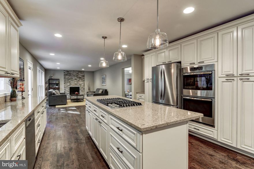 Gorgeous Brick Colonial has been completely renovated. Beautiful kitchen with quartz counters, new appliances, tile backsplash and center island. Family room with refaced stone fireplace. 4 bed/3 full baths on the upper level including a luxury master bedroom suite with custom closet system. Master bath with walk in shower. Laundry on upper lvl. Backyard with patio and new landscaping fenced yard.