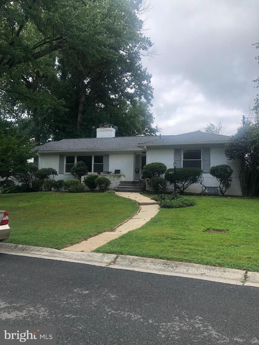 Classic large rambler with super spacious living room, separate dining room, studio/office, sun room to relax and observe the outdoors, hard wood floors on main level, 2 fire places, 2 car garage, great schools, great location off Massachussets Ave and short access to DC.