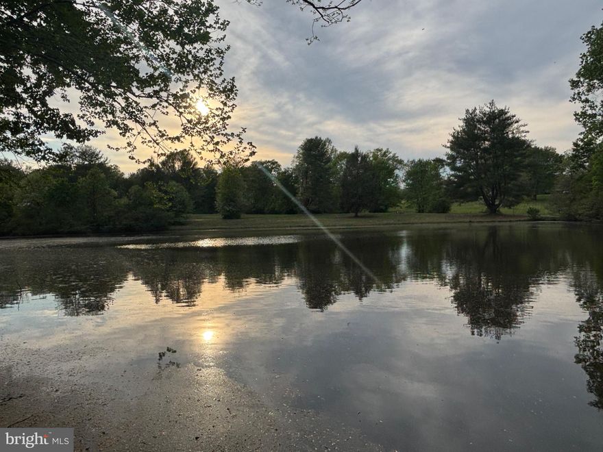 Opportunity for a quiet country retreat just minutes from the Town of Orange and area historic landmarks. This 4.82-acre offering includes two parcels (Tax ID 042A000000027A and Tax ID 042A0000000270) being sold together. This wooded property overlooks a shared pond in the Montford area, providing a private, peaceful setting ideal for a custom home or weekend getaway. Previous soil work was completed but is now outdated; purchaser to verify. Enjoy convenience to town amenities while maintaining a secluded feel. Priced to sell.