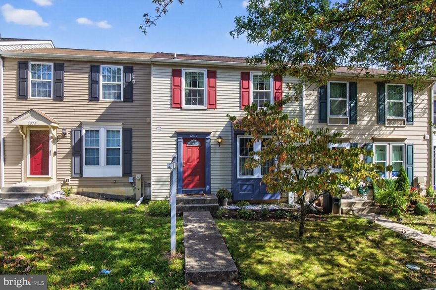 Welcome to this  community-focused neighborhood with easy access to parks, Howard County's new Rapid Ride service, and major commuter routes (I-95, Rt  100, and  rt 1). The Elkridge library, with its 50+ center is just around the corner.  When you arrive home, you'll have 2 assigned parking spaces.
Step inside to a light-filled, remodeled  kitchen featuring crisp white cabinetry,  KitchenAid and GE Profile appliances, an induction cooktop, Cambria quartz counters, soft-close drawers, sliding shelves, pullout spice rack, and a convenient appliance garage. The enlarged pass-through to the dining area makes entertaining a breeze. Custom built-ins  maximize space. Enjoy hardwood floors in the living area and stairs to lower level.
The  living room opens to a composite deck with steps to a  large yard and  wooded backdrop—a true escape just outside your door.
Upstairs, you'll find two generously sized bedrooms, and 2 full baths, offering  flexible space.
The finished walkout basement adds even more versatility with a rec room, workshop area, and ample
storage— with direct access  to a patio and view to green space....
Don’t miss this chance to own a  home with room to live, work, and play—
both indoors and out!