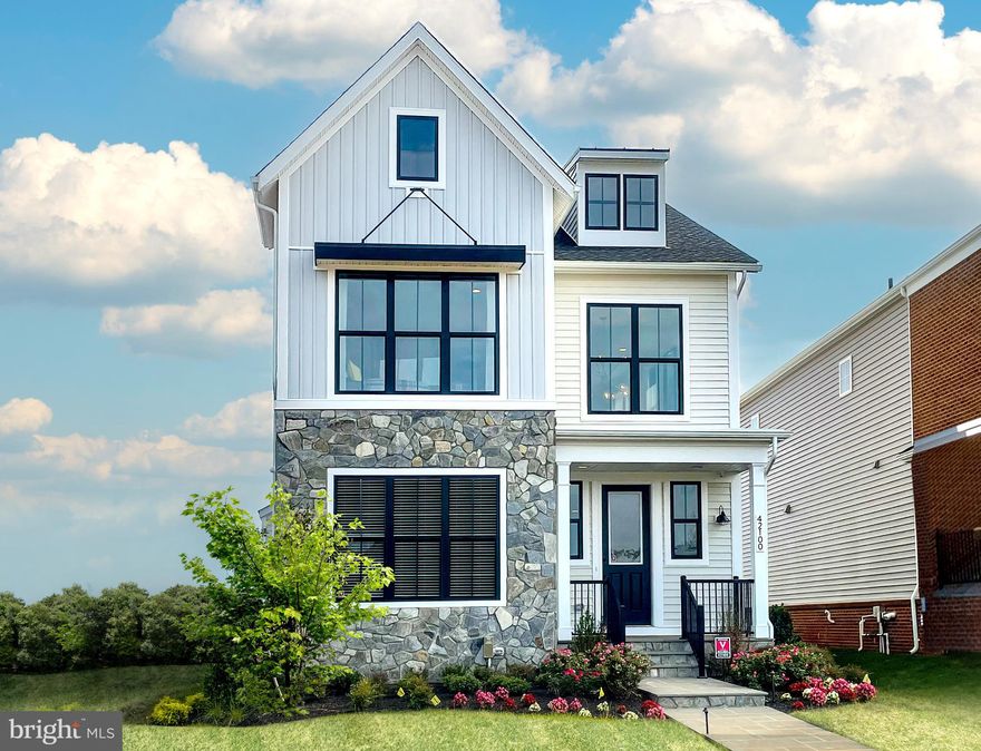 Beautiful Hamilton MODEL HOME available for sale—Immediate Delivery—Move in now! <br>

</br>With 3616 finished square feet on three levels, this HAMILTON floorplan by Van Metre Homes offers a 2-LEVEL EXTENSION, 6 BEDROOMS, 4 FULL BATHROOMS, and an EXTENDED 2-CAR GARAGE. With an abundance of natural light, the MAIN LEVEL showcases the ultimate in livability— including a bedroom, full bath, gourmet kitchen with upgraded cabinets, Carrara quartz countertops, stainless steel appliances, and wide Luxury Vinyl Plank (LVP) flooring throughout. The UPPER LEVEL features an impressive primary suite with a rooftop terrace and large walk-in closet; the luxury bathroom has double sinks, large frameless shower enclosure with a built-in seat and oversized soaking tub. The home also has a finished rec room, bedroom, full bath and wet bar in the lower level! This home is a stunning model home with many custom upgrades. You don’t want to miss this opportunity!!!<br>

</br>WEST PARK features an enclave of distinctive, Van Metre single family homes in the award-winning community of Brambleton, VA. Located directly across the street from Hanson Regional Park, these charming homes feature easy access to all the amenities Brambleton has to offer, including high quality schools, pools, clubhouses, tennis courts, and hiking and biking trails. West Park is minutes from Metro’s Silver Line, Dulles International Airport, and key commuter routes, like the Dulles Greenway and Toll Road, plus other local conveniences.<br>

</br>VAN METRE HOMES has been in business for 65+ years, knows how to treat customers and is recognized for commitment to quality, energy efficiency and customer warranties post-settlement. The limited warranty not only covers warrantable items your first year in the home, but mechanical parts of the home for the 2nd year and a 10-year structural warranty. Experience the peace of mind associated with purchasing a new, never -been-lived-in Van Metre home.<br>

</br>Pricing, incentives and homesite availability are all subject to change without notice. Images, renderings and site plan drawings are used for illustrative purposes only and should not be relied upon as representations of fact when making a purchase decision. For more information, see a Sales Manager for details. West Park at Brambleton lies within the Airport Impact Overlay District (entirely within 1 Mile Buffer). Due to its proximity to Dulles International Airport, this site is subject to aircraft overflights and aircraft noise