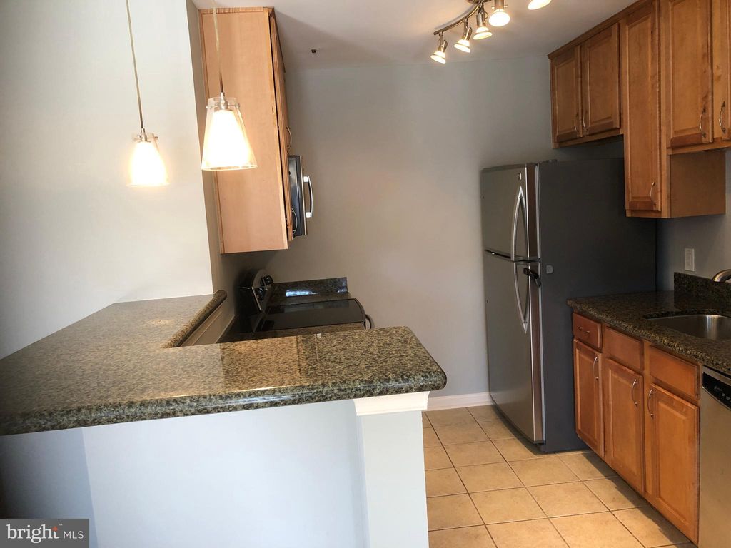 Photo of 3175 Summit Square Drive #5-D2, OAKTON, VA 22124 (MLS # VAFX2268538)