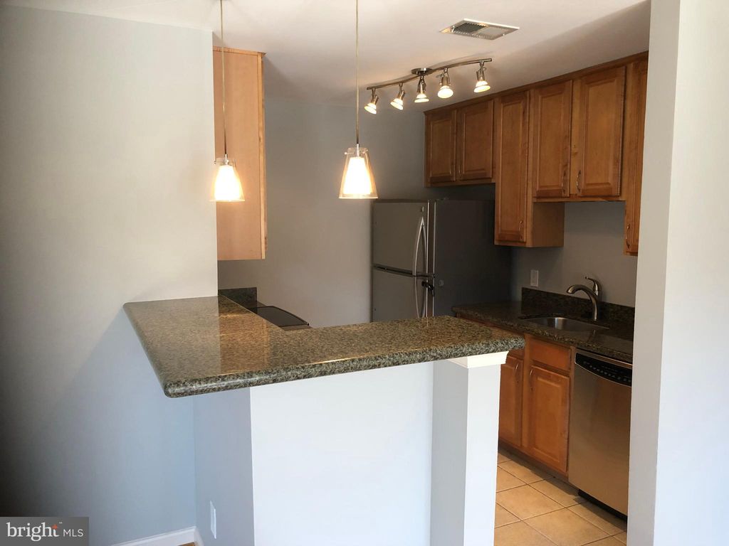 Photo of 3175 Summit Square Drive #5-D2, OAKTON, VA 22124 (MLS # VAFX2268538)