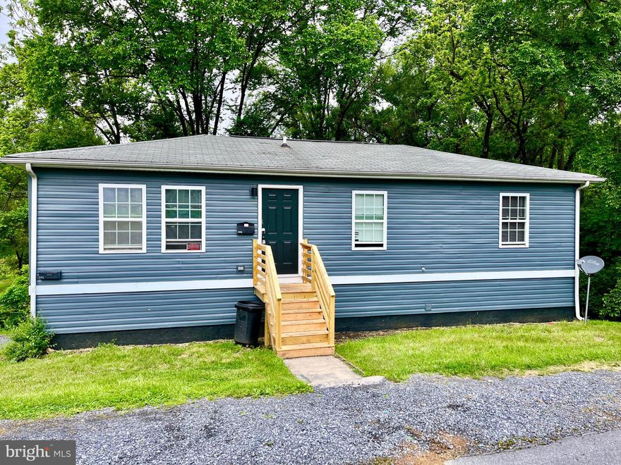 Why Rent When You May Own!!  Lower Level Is Leased...The Main Level Is Move In Ready.  Both Apartments  Are Large 3 Bedroom/1 Bath Homes.  Nice Semi-Private Lot In Town.  Live In One And Let The Other Help Cover Your Mortgage!  Call Today To Schedule Your Private Showing