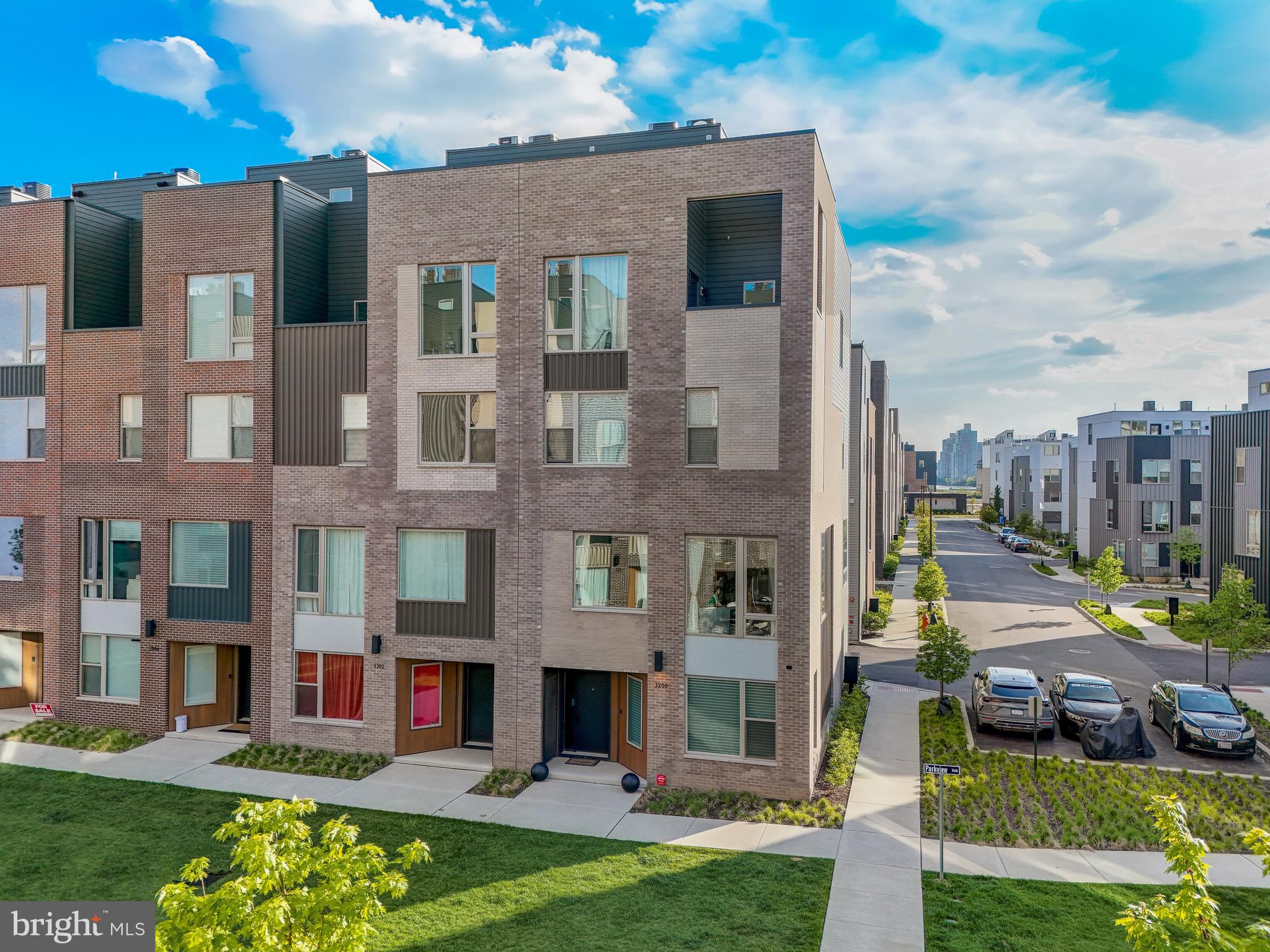 Welcome to waterfront luxury living at its finest in the prestigious Northbank community! This stunning end-unit townhome offers unparalleled elegance and convenience across four levels (with the ease of an elevator) of opulent living space. Upon entering you're greeted by the epitome of modern luxury. The first level welcomes you with convenient access to the 2-car attached garage, a private bedroom, and a full bathroom, providing both comfort and privacy for guests or family members. The main level sets the stage for grand entertaining with a large formal dining room complete with a built-in buffet counter perfect for hosting lavish gatherings. Adjacent is the chef's dream eat-in kitchen boasting a massive center island with seating, top-of-the-line stainless steel appliances, and gas cooking, ensuring culinary excellence for every occasion. The living room, adorned with abundant windows and a chic accent wall, offers a serene retreat bathed in natural light. Ascend to the next level and discover three generously sized bedrooms, each designed with comfort and style in mind. One bedroom boasts an ensuite bathroom for ultimate convenience, while the remaining two share a luxurious full hall bathroom featuring a water closet and dual vanity. Completing this level is the ultra-convenient laundry room, making household chores a breeze. The pinnacle of luxury awaits on the top floor, where the primary suite exudes sophistication and tranquility. Retreat to the expansive spa-like ensuite, featuring an oversized glass-enclosed walk-in shower, a soaking tub, dual vanity, and a water closet, offering a lavish sanctuary for relaxation and rejuvenation. A cozy sitting room provides the perfect space to unwind and provides access to the covered balcony. A wet bar on this level makes entertaining in style easy on the rooftop deck with breathtaking city and waterfront views, perfect for hosting memorable gatherings under the stars. For added convenience, an elevator services all five floors, ensuring effortless access throughout the home. Experience the epitome of luxury waterfront living in the esteemed Northbank community, where every detail has been meticulously crafted for the discerning buyer seeking the ultimate in comfort, convenience, and sophistication. Don't miss your chance to call this exquisite townhome your own!