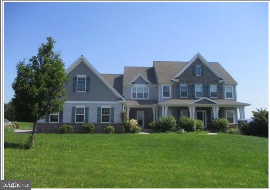 Multi generational house... excellent for extended families with main floor master bedroom suite plus 1/2 bath/powder room. 5 bedrooms upper level with an ensuite bathroom plus 1 full bathroom. partially finished basement with full bathroom. All this on 2 acres partially wooded. More information & photos to follow.
