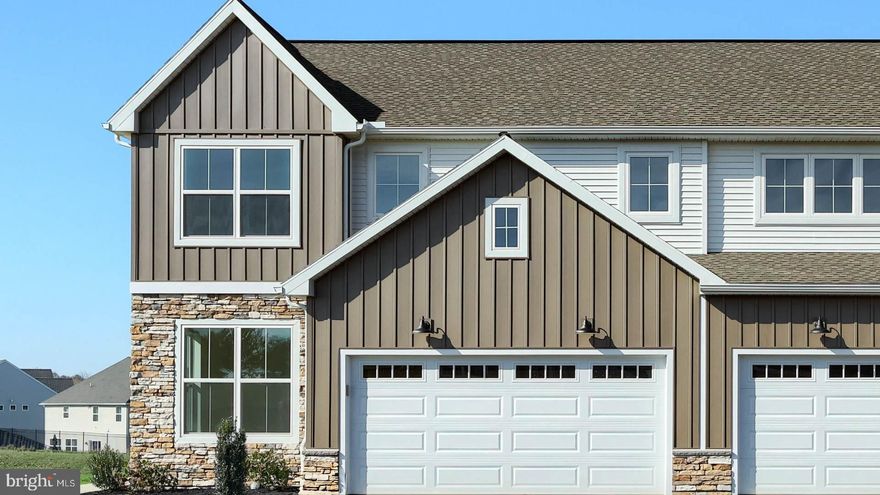 This brand-new 2-story luxury duplex at Edgemont Preserve embodies modern sophistication, blending stylish design with timeless comfort. The first-floor features 9-foot ceilings, stylish vinyl plank flooring, and a convenient 2-car garage with a mudroom entry. Just off the foyer, a bright and versatile study offers the perfect space for a home office or quiet retreat.
The well-appointed kitchen is a true highlight, featuring stainless steel appliances, quartz countertops with a chic tile backsplash, a spacious center island, and a dining area. The family room is warm and inviting, complete with a fireplace with a stone surround and sliding glass doors that open to the rear composite deck—perfect for outdoor relaxation or entertaining.

Upstairs, the owner’s suite provides a serene retreat, offering a generous closet and a private bath with a tile shower and double bowl vanity. Two additional bedrooms, a stylish hall bath, a convenient laundry room, and a versatile loft space complete the second floor, providing ample room for both comfort and functionality.

Located in Annville, PA within the Palmyra Area School District, Edgemont Preserve offers a charming small-town setting with unparalleled access to leisure, recreation, and everyday conveniences. Just minutes from the area's best dining, shopping, and premier attractions—including Hersheypark, the Giant Center, Mt. Gretna Lake, and several renowned golf courses—this exceptional community places you close to Hershey, Lebanon, and Harrisburg, with convenient access to Routes 422 and 322. Built by Landmark Homes, embrace the perfect harmony of luxury, comfort, and location in your new home at Edgemont Preserve. Contact the Community Sales Manager today and discover everything Edgemont Preserve has to offer.