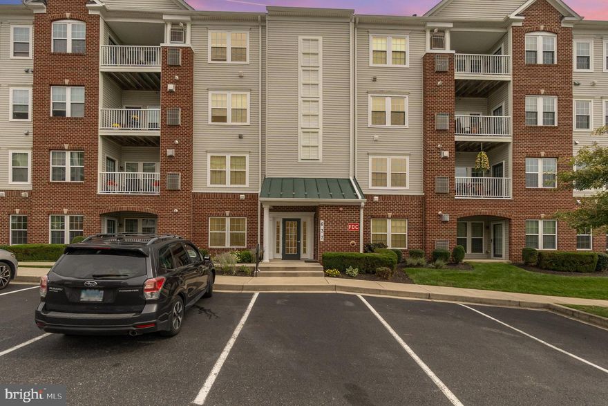 Spacious and well-maintained 2-bedroom, 2-bath entry-level condo located in a sought-after 55+ community. Features include a large kitchen with island, generously sized rooms, an inviting living space with a cozy fireplace, and a functional layout ideal for easy living. Enjoy sitting outside on your private patio. A perfect blend of comfort and convenience! Tons of closet space and assigned parking too!