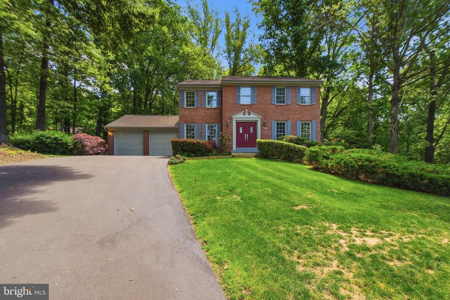Welcome to 6423 John Jackson Court, a lovely brick, center colonial home beautifully situated on a very flat lot on a quiet cul-de-sac in the highly desirable Fairfax Station community. A newly bordered, slate walkway leads to the massive double front doors where the large, center foyer invites you to explore the countless updates and upgrades within.
The center foyer is flanked on the left by a formal living room and on the right by a formal dining room. Both rooms have beautiful, hardwood floors, windows that stretch floor to ceiling and allow generous amounts of natural light and fresh, neutral paint.  Enter the Swedish-inspired, upgraded kitchen from the dining room where you’ll find contemporary-styled cabinets, a massive pantry  and high-end appliances, including a Wolf cooktop, a Bosch dishwasher and a Dacor oven. Granite countertops complete this stylish kitchen and a uniquely-fashioned island allows a comfortable, casual eating space.  Bay windows in the back of the house let in the natural beauty of the vast backyard and a family room with a converted gas fireplace makes the space a cozy retreat when relaxing or entertaining. 
From the family room, enjoy the solid wood deck that overlooks almost 1/2 acre of cleared lawn with wooded privacy! 
The upper level includes 4-bedrooms 2 full bathrooms with many updates, including the new, plush carpet, all new vanities, fixtures and fresh new, neutral paint.  The primary suite is spacious enough for a small office or sitting room area and the laundry area with Miehle washer and dryer is on this level for household convenience.
With over 1,000 sq feet in the lower level, the possibilities are endless to finish this space!  A play area, man-cave, family room, golf simulator, game room or movie room are all within the realm of possibilities!  A convenient sliding door leads directly to the backyard where memories can be made!
In the basement you’ll see the Carrier HVAC, AO Smith Water Heater and hanging insulation throughout.  Major commuting routes are just minutes away:I-495, I-66, Fairfax County Parkway, Route 123 and the Burke VRE.  Make this house your home!