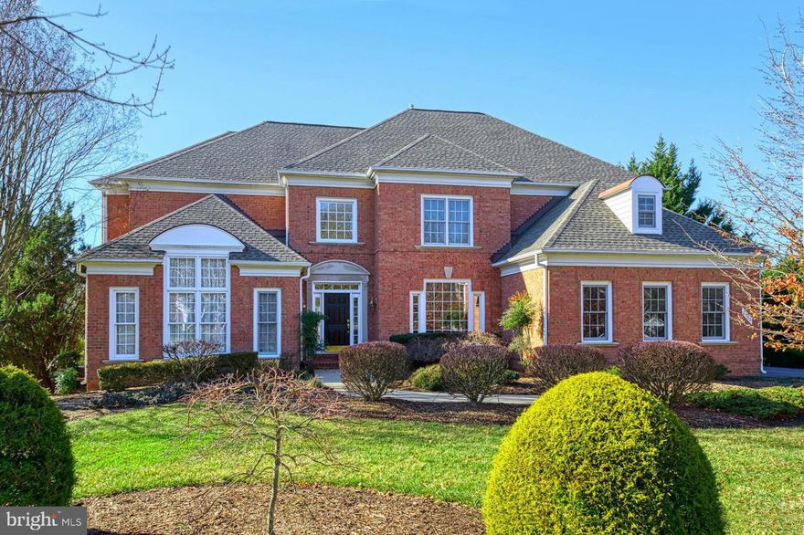 Fabulous waterfront colonial with stunning western views off all three levels of rear of home!!!  Wonderful upgrades throughout including refinished hardwood floors, newer lighting, moldings, two-story windows, palladium windows, newer appliances, two newer HVAC units, recent roof, freshly painted interior, grand primary suite and walkout lower level!!!  What an amazing versatile floorplan with sunroom/library/music room/living room/main floor bedroom/office all wrapped around the stunning Great Room with two-sided gas fireplace.   This unique Stone Ridge Compton model is rarely available and features over 7,000 total square feet... with 6,000 sq.ft. finished.   Welcoming foyer with hardwood floors and new sconces.   Large dining room with new chandelier, wainscoting, dental molding and recessed lights.  Open gourmet kitchen with granite, stainless steel appliances, island with barstool seating, gas cooktop, hardwood floors, large pantry and desk area.  There is both a breakfast room and sitting area off the kitchen, both overlooking the community's upper lake.   Upper level includes a grand primary suite with sitting room, walk-in closet and large bath with sumptuous Jacuzzi whirlpool tub and separate shower.   Three additional large bedrooms upstairs, each with walk-in closets, and two additional full baths.  The lower level is filled with windows and includes a large recreation room with French doors to a slate patio, the sixth bedroom with a fifth full bath, a large office and plenty of storage.   What a home and what a setting!!!  Even the three-car, side-load garage is extra deep for extra storage.  Timber Lake is one of Oakton's premiere communities with two lakes, a meandering stream, a pastoral common area and walking trails to County parkland.  It is convenient to the Town of Vienna and the nearby job centers in Tyson's Corner and along the Dulles Technology Corridor.