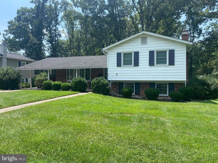 Open House Today 11 AM to 1 PM.  Professional Photos up Tuesday 5/12.
Lovingly maintained home just minutes from historic Olde Town Gaithersburg, local parks, Bohrer Park at Summit Hall Farm, schools, shopping, restaurants, and major commuter routes. This spacious four-level home features three bedrooms, including a primary suite, two full bathrooms, family room with a cozy gas fireplace, recently replaced roof, one-car carport with a large concrete driveway, hardwood floors, large workshop complete with workbench, vice, & shelving, replacement double-pane windows, a welcoming front porch, plus a large rear porch overlooking an expansive, landscaped backyard—all on nearly one-third of an acre!  Curb appeal is an understatement!  HURRY, this special home will not last!