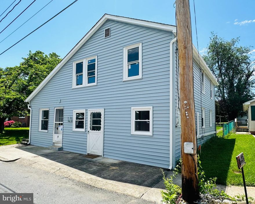 Back By "POPLAR" Demand!! This Wonderfully Unique Fully Renovated Multi Unit Tucked Away in the Hidden Gem of Funkstown is Now Available for Your Buyer Seeking to Live in One Unit and Enjoy Rental Income from the Second Unit. Both Units Trendy in Their Upscale Renovations this Investment Appeals to the Savvy Investor As Well! Top to Bottom , Inside and Out This Opportunity is Fully Renovated! New Roof, New Siding and Gutters, New Windows, Long, Narrow Lot with Two On-Street Parking Spots Right in Front for Added Convenience Enjoy the Depth of this Lot with Lush Yard Space and Shaded Landscaping in the Back!! Choose Your Favorite Space.. Each Unit Boasts Two Bedrooms and One Full Bath, Updated Electrical and Plumbing , MiniSplits Add the Comfort of AC to this Vintage Charmer in the Summer Months. Main Level Dares to Be Different with Handsome Blue Cabinetry , White Veined Quartz and Matching Octagon Tile Backsplash. Stainless Steel Appliances and Bonus Counter for Desk or Additional Coffee Bar, New LVP Flooring Throughout the Main Traffic Areas and New Blended Carpet with Upgraded Padding for Warmth in the  Bedrooms. Separate Laundry Closet with Cabinets for Extra Storage and 1 Full Tiled Bathroom with Shower. Multiple Recessed Lights Throughout and Designer Brushed Gold Fixtures Complete this Living Level. Up The Flight of Original Gleaming Hardwood Floors to the Second Level Offering the Same Opportunities As Below BUT with the Addition of a Separate Dining Area and Walk In Laundry/Pantry Off the Kitchen. City Loft is the Designer Color Palate Chosen for Both Units. Upper Space Blends a Warmer Grey Cabinetry with Complimenting  Granite and Stainless Appliances. Original Hardwood Floors Refinished to the Original Glory of Yesteryear! Full Bath Enjoys a Tub for Soaking and Tiled Floors and Tub Walls with Niche. Antique Bronze Hardware and Fixtures Throughout Are the Final Touch for this Living Space! Wonderful Investment in Washington County! No HOA
This Gem Won't Last Long!