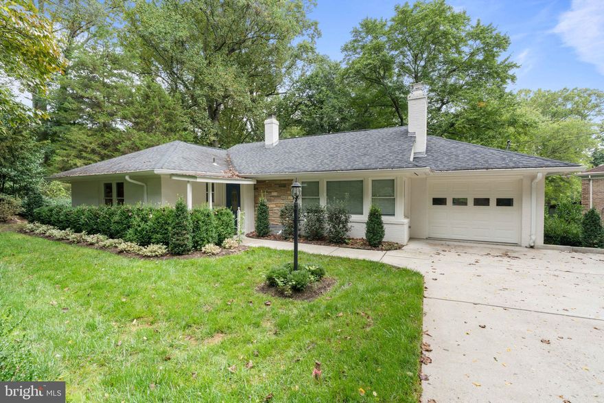 Discover a charming rambler for rent in the desirable Chesterbrook neighborhood. This home sits on a generous 1-acre lot, boasting mature trees and meticulously maintained gardens. A convenient front parking area and entry gate welcome you to the property. A scenic walkway leads to a covered porch, inviting you into the home. Inside, the living room features corner windows and a cozy wood-burning brick fireplace. This space flows seamlessly into the dining area, offering beautiful views of the lush surroundings. The kitchen impresses with granite countertops, stainless steel appliances, recessed lighting, and new LVP flooring. Hardwood oak floors grace the main level, which includes a primary bedroom with an ensuite bath, two additional bedrooms, and a full hall bathroom. The lower level houses a spacious recreation room complete with a wood-burning fireplace and walk-out access to a patio overlooking the grand backyard. This floor also features a fourth bedroom, another full bathroom, and a laundry room with space for exercise or additional storage. Located across from the 25-acre Mary Leven Sanctuary Park, this home offers a perfect blend of nature and convenience. Enjoy easy access to GW Parkway, Tysons, and the center of McLean, with just one traffic light between you and Washington, DC. This property truly combines the serenity of spacious living with the advantages of a prime location.