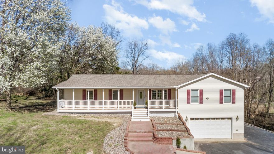 Beautifully customized home featuring a stunning kitchen with abundant custom cabinetry, sparkling black granite countertops, and ample seating. Brazilian cherry hardwood floors add warmth and elegance throughout the main living areas. The spacious great room offers vaulted ceilings and a cozy propane fireplace.

The private owner’s suite features vaulted ceilings, a walk-in closet, and convenient washer and dryer. Two additional bedrooms on the opposite side from owner's suite. Enjoy the backyard from the large sunroom just off the kitchen.

The finished lower level includes stylish trim work, a full bath with ceramic tile shower, and additional storage space, plus den / bedroom for guests. Behind the garage is a fully finished in-law suite with kitchenette and full bath, perfect for family or guests. 

Two car garage with additional storage under in-law suite, plus additional parking for vehicles or an RV. Built with 2x6 construction and equipped with a high-efficiency 3-zone, 21 SEER HVAC system, keeping utility bills low. Pellet Stove for extra heating in the basement. A large private backyard completes this exceptional property. Contact Listing Agent for more details!