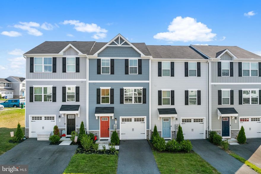 Get ready to fall in love with this beautiful 3-level interior townhome in the highly sought-after Village at Meade’s Crossing. From the moment you walk in, you’ll feel right at home. The lower level offers convenient access to the attached 1-car garage (plus driveway parking) and a flexible bonus room—perfect for a cozy home office, playroom, or extra storage space. You'll also love the added convenience of a half bath on this level—ideal for guests or day-to-day comfort.

Head upstairs to the main living area where natural light fills the spacious living room. The open-concept kitchen and dining area are ideal for both everyday living and entertaining, featuring stainless steel appliances, plenty of cabinet and counter space, a center island, and access to the back deck—your perfect spot to relax or enjoy morning coffee.

On the upper level, you'll find three generously sized bedrooms, including a lovely primary suite with a walk-in closet and its own private bathroom—your personal retreat at the end of the day.

This home truly has it all—space, style, and a great location. Don’t wait—schedule your private tour today and see all that this wonderful home has to offer!