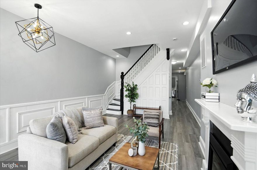 HOME SWEET HOME!!! Where else can you find a home this massive ,  fully renovated for under 300K!! Visit this REMARKABLE HOME TODAY! AFFORDABLE LUXURY at its BEST!!! This beautifully fully renovated 3 story BRICK townhome boasts a perfect blend of historic charm and modern amenities, making it an ideal haven for families, professionals, and anyone seeking a unique lifestyle and living experience. This Urban Oasis has a classic 3 story BRICK facade, complete with original architectural details that include the classic Baltimore-stained glass, full wall inlays, wainscoting throughout and beautiful winding handrails. Your new home will provide the space your family needs to grow and entertain. The interior flaunts high ceilings, oversized windows on every level with classic shutters on the first floor, beautiful LUXUARY Vinyl floors creating a bright and airy atmosphere throughout. When you enter your home the living room provides awesome space to entertain and greet all family and friends. Make your way through the dining room and the kitchen. Allow your inner chef to be free with this magnificent gourmet kitchen fully equipped with NEW Stainless-Steel Appliances, beautiful counters, an Entertainers Bar, and more cabinet and counter space than you likely need, which includes a pantry. Your new home is equipped with 4 SPACIOUS bedrooms, each with ample closet space, including a bonus room on the master suite level that can be used as an office or a CUSTOM CLOSET. Did I mention the Master SUITE has it’s on entire LEVEL!!!! With bathrooms on each level you’ll never run out of space. The bathrooms are tastefully designed with modern fixtures and soothing color schemes. Bring your ideas and turn this remarkable renovation into your place of refuge. The neighborhood offers various amenities, including parks, shopping centers, and community events. Located within walking distance to ALL of Baltimore’s HOTTEST attractions, this property offers easy access to everything Baltimore has to offer like the Inner Harbor, Fells Point, Caton, Patterson Park etc. Steps away from John Hopkins & Kennedy Krieger this investment will continue to pay dividends for years to come.  Whether you're looking for a forever home or an investment opportunity, this is an excellent choice. With its desirable location, historic charm, and modern amenities, this property is a cut above the rest.  Don't miss the opportunity to make this house your home. Schedule a tour today and experience the unique character of this exceptional property for yourself! BUYERS MAY QUALIFY FOR LENDER SPECIFIC GRANT FUNDS UP TO $$6,000 & FHLB at $$17,500 & LNYW at $$17,000 TOTALING UP TO $$ 40,500. Other Funds may be available to increase these GRANT FUNDS.  CALL TODAY TO DISCUSS. 
WHY RENT WHEN OWNING DOES SO MUCH MORE FOR YOUR FUTURE!!!