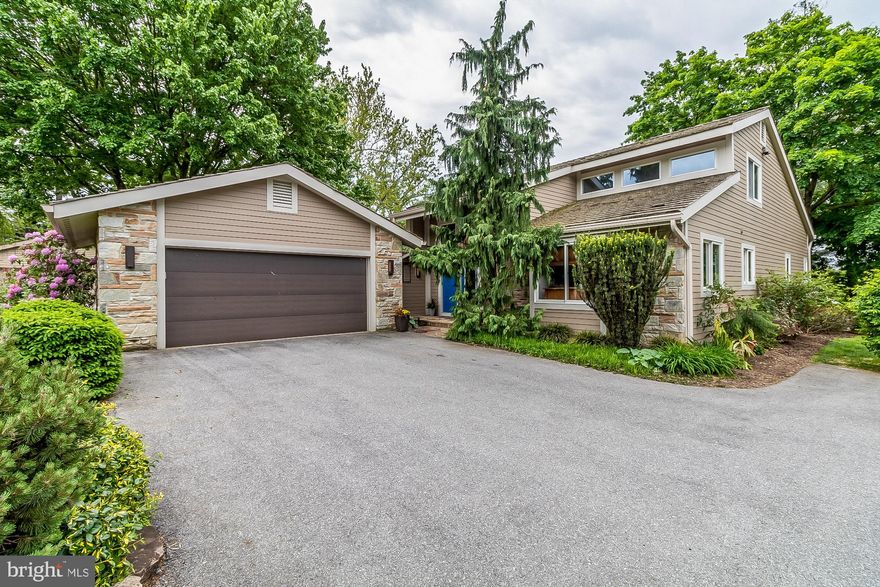 This stunning contemporary home features a high end kitchen overlooking the living . Redone in 2019 with quartz counters, new cabinets, Island with gas cook top, double oven, microwave and bar with beverage cooler. There is a main level laundry / mud room off the 2 car garage and a welcome center. Wonderful entry foyer leads to step down living room with built-ins and gas fireplace. Dining room with hardwoods off of the kitchen. Spacious main level primary bedroom with walk in closet, soaking tub, walk in shower. Main level office / den. Upper level features 2 bedrooms and a loft. Full bath with new finishes and fixtures. Main level new Trek deck with concealed fasteners 2019. New Trane units including exterior condensing units installed along with tankless water heater 2019. New Hardie Plank siding on entire house 2019. LED lighting throughout.