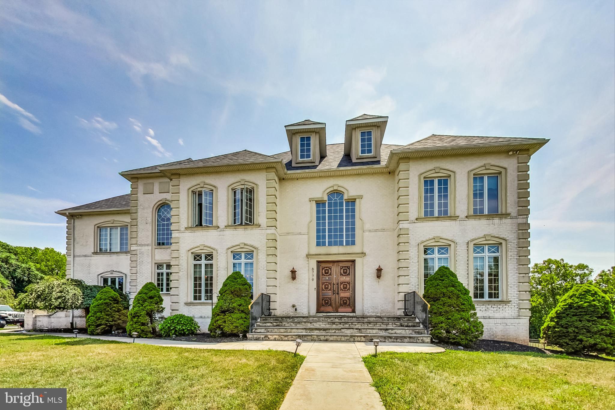 Experience unmatched luxury in this stunning 3 bedroom, four-and-a-half-bath estate, spanning over 8,500 square feet on a private six-acre lot. The grand marble foyer welcomes you into a beautifully designed space, including a formal dining room, living room, and play area. Basement has a big Den that can serve as a guess room.
The custom gourmet kitchen, equipped with Sub-Zero and Wolf appliances, dual islands, soft-close cabinetry, upgraded countertops, and a pot filler, is a chef's dream.
The upper-level master suite offers a serene retreat with a spa-inspired bathroom, while the lower level includes a fourth bedroom, full bath, entertainment area, and bar.
Outside, enjoy breathtaking sunsets by the in-ground pool and entertain with ease in the full outdoor kitchen. Hand-forged stair railings, oversized moldings, custom solid doors, custom window treatments, and exquisite millwork add to the home’s luxury.
Private tours are available for qualified buyers.