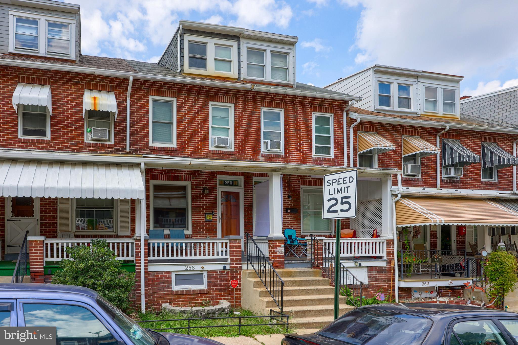 Really cool home and design in this 3 bedroom row home with open staircase. All brick front and located up on Linden St. Very cute front porch and a really nice deck as well as a 2nd floor balcony to enjoy the view of the city and countryside. Large open floor plan with wood flooring throughout. Large LR/DR and a very nice kitchen with granite counters, gas range, dishwasher. This home was redone prior to this owner's purchase and the plumbing and electrical were redone at that time. (per the previous MLS description) Very nice primary bedroom and also a large 3rd floor bedroom. I love this home. Nice area and really nice spaces. The home needs a quick refresh to bring it right back to beautiful!
