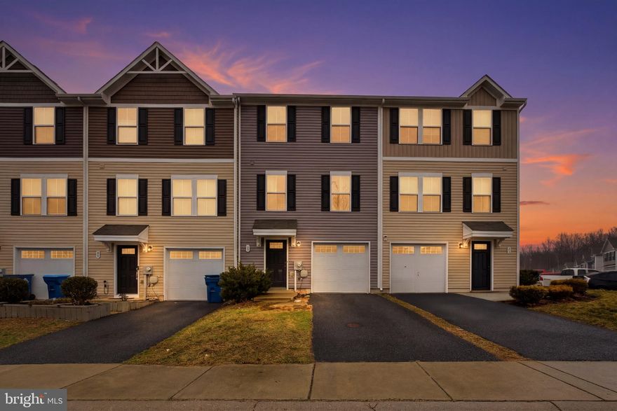 Built in 2019,  this 3-bedroom, 2.5-bath townhome in the desirable Ridgely Forest community features a bright open floor plan with spacious living areas and an eat-in kitchen complete with stainless steel appliances, recessed lighting, a large center island, and ample cabinet space—perfect for everyday living and entertaining. The generously sized primary suite includes a walk-in closet and private full bath, along with two additional bedrooms. The laundry room is conveniently located on the second floor for added ease. The basement offers walk-out access to the backyard and additional storage space.  The home includes an attached garage with driveway parking, plus additional guest parking nearby. Ridgely Forest offers fantastic community amenities including a pool, clubhouse, playground, dog park, and scenic walking paths. Conveniently located near shopping, dining, and major commuter routes, and just minutes from the Delaware state line.