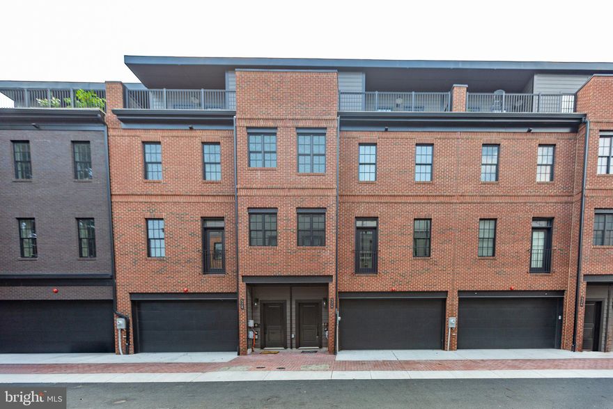 ONLY ONE  ELEVATOR UNIT REMAINING!  Don’t miss your chance to live at Riverplace in Downtown Fredericksburg!
READY FOR YOU TO  MOVE IN!     Enjoy the perfect location as this home is unlike anything else available in the City of Fredericksburg. Each thoughtfully designed row home features a unique brick exterior, private FRONT AND REAR rooftop terrace, and high end interior finishes. Hand scraped hardwood floors, extensive trim and wood beams on the kitchen/family room level, and beautiful cabinetry featured throughout. This unit has a  balcony deck off the main level perfect for grilling and entertaining,  a 2 car garage, and 4 bedrooms. Enjoy living across the street from the Rappahannock River, one block to the new Riverfront " SMART" Park , walking distance to the Virginia Railway Express, city dock, restaurants and downtown shopping. 
Builder is offering $5000 in closing cost assistance when using the builder's preferred lender and title company.



 Live Where You Love!