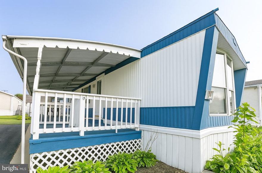 Welcome to Briarwood Estates – Affordable Comfort Just Minutes from the Water! 
This charming 2-bedroom, 2-bathroom manufactured home is move-in ready with luxury vinyl plank flooring throughout and a layout that blends space and style.

Step onto the extended covered porch, ideal for morning coffee, evening relaxation, or dining al fresco. Inside, you'll find a spacious great room, perfect for entertaining or cozy nights in. A full guest bathroom and second bedroom are thoughtfully positioned at the front of the home for privacy.

The heart of the home features a dedicated dining area and a well-appointed kitchen with ample cabinetry, generous counter space, updated finishes, and a convenient laundry area with washer & dryer included.

The true showstopper? The oversized primary suite-plenty of room for a king-size bed, dual mirrored closets, and a spa-like en suite with a large garden soaking tub.
Bonus feature: A storage shed with electric and built-in shelving conveys with the property, offering the perfect space for tools, seasonal items, or hobby storage.
Located just minutes from serene water views, this home is perfect for those seeking comfort, convenience, and coastal charm.
Ground rent: $795/month, Water billed separately

Don't miss your chance to live in one of the area's most desirable manufactured home communities! Schedule your private tour today.