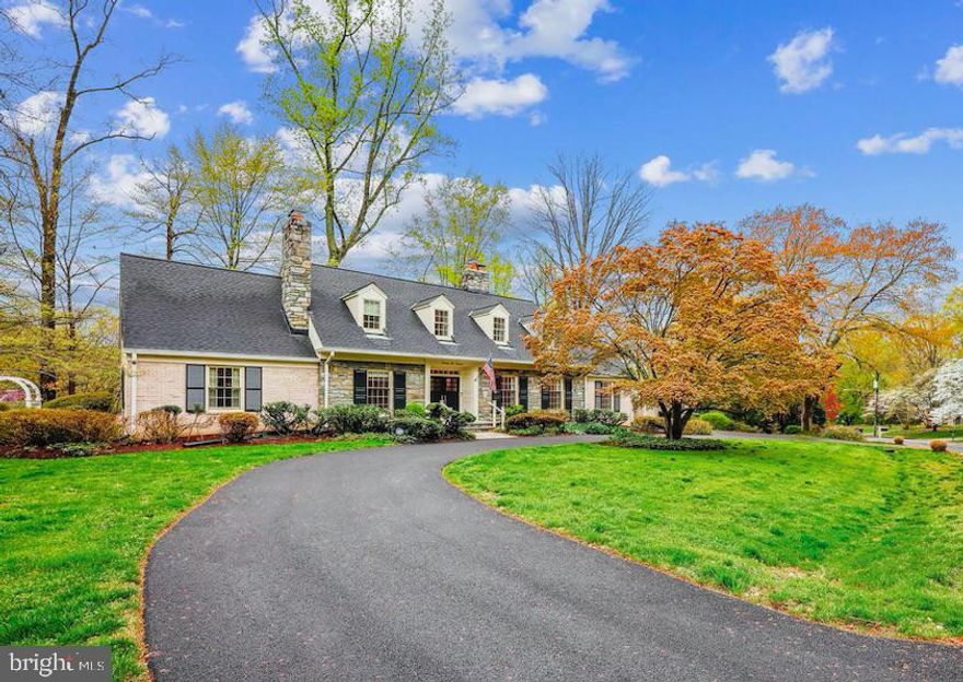 Welcome to 7100 Darby Rd. A grand home located on a large corner lot in the sought-after Bradley Hills Grove Community! The inviting entry foyer leads you into a spacious main level with formal living room featuring 1 of 4 fireplaces, formal dining, the family room provides fireplace number 2, wet bar & large picture window looking out onto flagstone deck & backyard. The renovated chef’s kitchen features custom cabinets, granite counters, high-end stainless-steel appliances including 5 burner gas cooktop & double wall oven as well access to deck. The main level also features a home office with built-in shelving & the 3rd fireplace, a spacious primary suite with 2 large closets (1 walk-in), gorgeous renovated primary bath as well as a 2nd main level bedroom with renovated bath. 
The splendid curved staircase leads you to the upper level offering 2 bedrooms and renovated hall bath. Walk down the hall to an additional bedroom featuring a renovated en-suite bath. 
As you walk down into the lower level, you’ll find the walkout to the backyard & deck. The rec room is perfect for entertaining with the 4 fireplace, pool table & brand-new carpet. Large storage area rounds out the lower level. A large 2 car garage provides additional storage area. Renovations & updates abound in this wonderful home including fresh paint throughout, refinished hardwood floors, renovated kitchen & baths, high-end Pella windows, HVAC, 75 gallon water heater, whole house water filter, solid mahogany front doors, all GAF architectural shingle roof, gutters, downspouts & paved driveway. This is truly a special home that should not be missed!