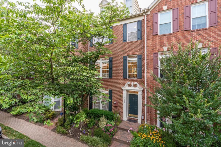 Fully renovated 3-level + loft, 3 bedroom, 3 bathroom townhome in popular Old Town Greens. Superb condition with 3 high-quality fully renovated bathrooms all done in 2017, new roof (2020), new HVAC (2020), and refinished solid oak wood floors (2017). Enter the residence through the entry foyer or the 2-car garage; this level also features a bedroom suite with full bathroom, making this room perfect for a bedroom or office or BOTH - plus a large laundry room that can double as a mud room. The main level features an eat-in kitchen with center island and breakfast nook with gas fireplace and access to your private balcony perfect for enjoying a morning cup of coffee - not to mention the added benefit of open sight-lines (no looking into neighbors houses!)  The dining area with modern fixture and spacious living room complete the main level. Retreat to your primary bedroom suite with vaulted ceiling renovated bathroom, walk-in closet, multiple windows streaming natural light AND loft perfect for an office space, nursery or yoga studio. A third bedroom is also located on this level. Other highlights of the home include 9 foot ceilings, solid oak wood hand-finished floors,  moldings, recessed lighting and  fireplace.  Community amenities include pool, tot lots, and wooded nature trails. World-class location: 0.3 miles to Slater's Market and Rustico, 0.6 miles to the NEW Potomac Yard Metro, 1.6 miles to Old Town, 2.8 miles to Reagan National Airport, 3 miles to Amazon's HQ2, 4 miles to the Pentagon, 5 miles to National Harbor, and 6 miles to Washington DC.