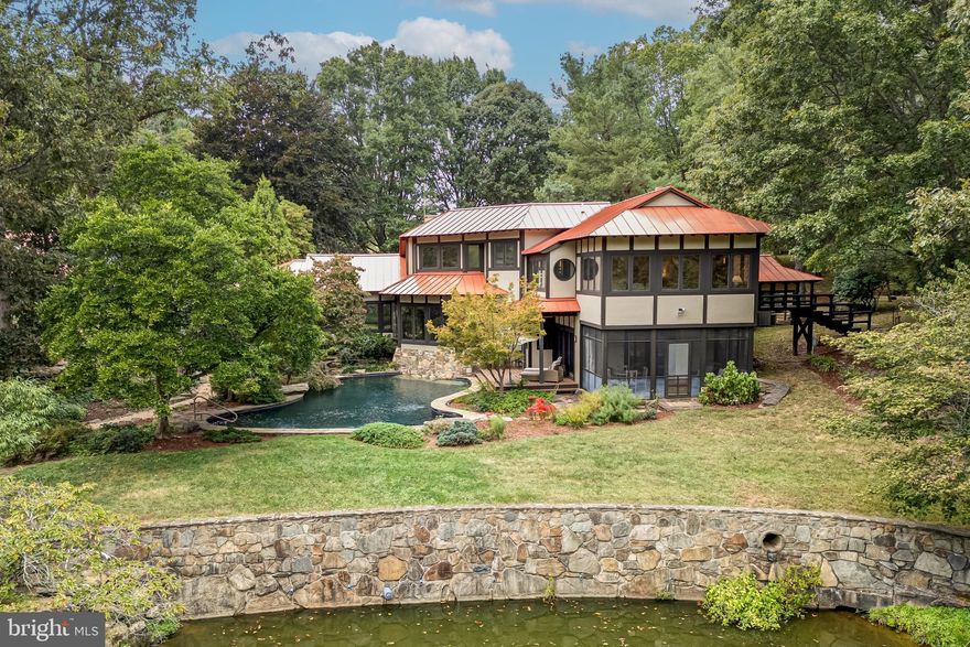 Oak Hollow — A Harmonious Haven of Craftsmanship and Nature

Tucked away in Orange County Hunt territory, minutes from The Plains and I-66, lies Oak Hollow, a breathtaking 30-acre farm that blends refined architecture with the timeless tranquility of nature. This extraordinary property is a masterwork of Craftsman style, deeply influenced by the quiet elegance of Japanese design—drawing inspiration from none other than the revered Katsura Imperial Villa, one of Japan’s most beautiful architectural treasures.

Every inch of Oak Hollow is handcrafted with reverence for natural materials and a philosophy of balance and serenity. Custom designed and built in the mid 1980's, the sprawling main residence is composed of warm, exposed woods and simple, graceful lines that invite nature in at every turn. Large windows frame curated views: to one side, a small koi pond reflects the sky; to the other, a shimmering black bottom pool gives way to a larger pond that stretches toward the tree-line.

As you explore the home and its surroundings, the garden tells a quiet story. Close to the home, the landscape is intimate and detailed, a living tapestry of meticulously arranged plants, water features, and stones. Venture further, and the gardens gradually loosen into open farm fields, blending with the broader rhythm of the land. This transition—from crafted garden to expansive farmland—is seamless, embodying the Japanese ideal of a space at peace with itself.

Paths meander through what feels like an unfinished Japanese walking garden—evocative, poetic, alive in its evolution. Water flows gently through the land, connecting the home to a series of serene, terraced ponds below. The grounds could be an arboretum in their own right, rich with native Virginian species and hidden corners of botanical wonder. The gardens and fields are abundant with plants native to the Virginia Piedmont and Blue Ridge Mountains, filled with enough species to qualify as a Level 1 arboretum. 

As you enter Oak Hollow, the barn greets you to the right—offering seven well-appointed stalls and generous turnout pastures. A simple, grass riding ring sits across the drive.

The main living room is a revelation—anchored by handcrafted built-ins, including butterfly joints inspired by George Nakashima. and oriented toward dual vistas. Throughout the home—living room, dining room, family room, and primary suite—custom woodwork and timeless design elements abound. The main house residence, approximately 3,400 SF,  offers three serene bedrooms and three finely appointed baths. The primary suite is a true retreat, complete with a private office set at the rear of the home, overlooking the layered gardens, pond, and distant forest—a perfect vantage point for inspiration or quiet reflection. 

Connected by a softly lit covered walkway, the guest house, 1,600 SF,  offers yet another space of tranquil refinement. With soaring vaulted ceilings, exposed beams, a full kitchen, spacious living area, primary bedroom, bath, and ample storage, it mirrors the craftsmanship and calm of the main residence—yet feels like its own meditative escape.  

Oak Hollow is more than a home. It is a sanctuary—where architecture, land, and water exist in perfect harmony. It’s a rare and beautiful place, both connected and secluded, just minutes from modern convenience.  SUBDIVISION creating one an additional lot ( 4.5 acres) is allowable.