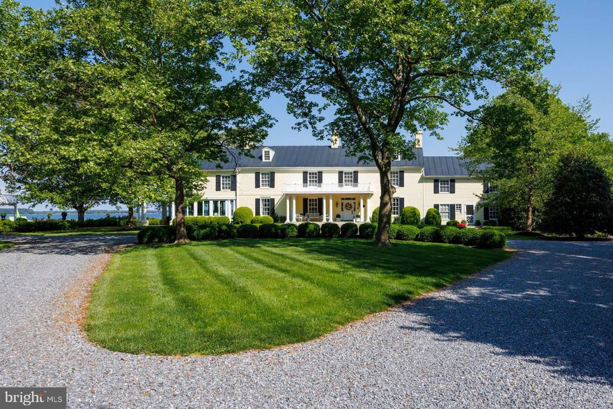 Please do not drive down the driveway without an appointment. 
Welcome to WOODLAWN FARM , an exceptional estate offering panoramic vistas with breathtaking skies and SPECTACULAR sunsets! Bordering both Broad and Bridge Creeks, this historic 91 + acre property with 3250' (much rip-rapped ) waterfrontage provides the utmost in privacy! From the gated entrance, a long tree-lined drive leads to the 6693 Sq ft. Manor house  which has been beautifully restored and includes major additions added by the present owners. Charm and elegance abounds with a sumptuous primary suite, stunning glass-filled sunroom, 5 fireplaces, gleaming pine floors, and high ceilings in much of the house. The large covered outdoor porch on the waterside is ideal for dining and relaxing and extends to a slate patio with BBQ and fireplace. Nearby is a putting green. Perfect for entertaining!

The 2 BR pool house with living room and kitchen has been renovated and overlooks the saltwater gunite pool with panoramic creek views.  In addition is a full 4 BR guest cottage, separate children's playhouse, and multiple barns/outbuildings. Two protected piers offer several slips, 3'MLW, electric and water. Main and service gated entrances, extensive security system and outdoor lighting, plus mature landscaping with irrigation, are just a few of the amenities. Complete list of improvements plus the history of the property is available. 50+/- acres is currently farmed and there is great hunting (duck blinds convey) back in the cove of Bridge Creek.
Most furnishings are available for sale (excluding art and owners personal belongings).