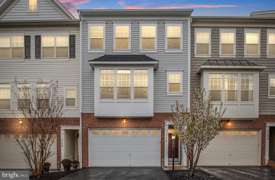 Beautiful Two Car Garage Townhome in North Stafford!  Modern and chic open concept floor plan.  Main level boasts hand scraped cherry wood flooring.  Magnificent kitchen with immense counter space and luxurious cherry cabinets! Bright and airy living room with granite trimmed gas fireplace.  Elegant dining room with recessed lighting and crown molding. Spacious Master bedroom with recessed ceiling, full bath, and walk in closet. Fully finished walk-out basement with direct access to huge garage! Absolute commuter's dream location.  Minutes from I-95 access, Route 1, and Commuter Lot! Shopping and dining nearby! Priced to sell!  Come see it today, as this one will not last long!