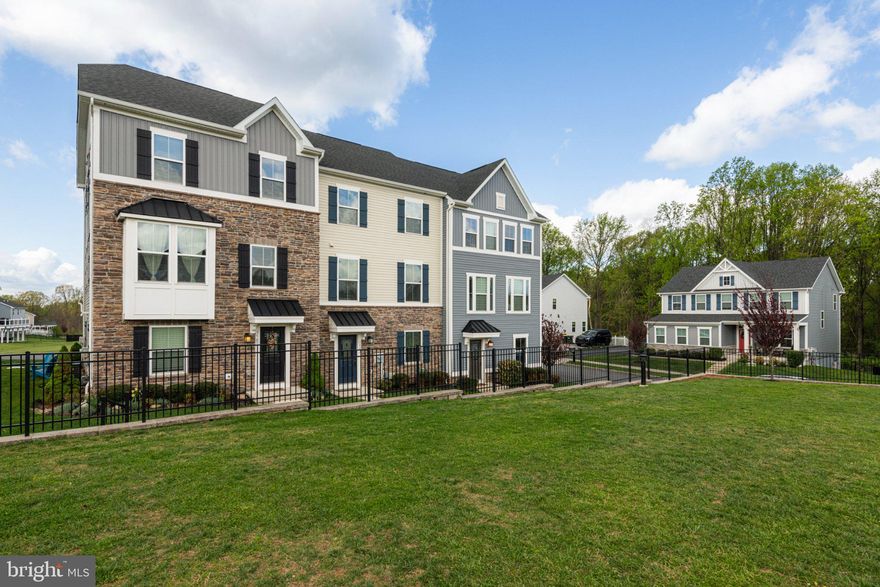 Absolutely gorgeous three-story townhome in Downingtown School District.   This home has three stories of living space!!  The first level features a great bonus room that can be used as an office space or additional living room with great closet space.  Upstairs you are welcomed into a lovely kitchen with a great center island, large dining room and updated appliances.  This space is great for entertaining!  A nice sized living room and powder room finish out this level.  On the third floor you will find 3 nice sized bedrooms and two full bathrooms, you will not be disappointed with the closet space in this home.  The home is perfectly oriented to enjoy sunset on your rear deck while you unwind from your day.  Parking will not be an issue, a nice sized two car garage and an additional driveway with plenty of room.  Outside the community offers plenty of green space with fantastic walking trails that wind through the woods.  The community itself offers a lot of great activities, ice cream socials, children's events and community gathering opportunities.  Come see what makes this place feel like HOME!