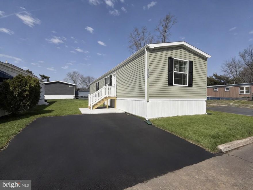 This affordable home comes complete. Two bedrooms and two full baths. The main bath features a walk-in shower, and the other bath has a tub. There is a separate laundry area with all hook ups. Central air and upgraded kitchen appliances are also included.  Built to last with all LED lighting.  plus a 2 through 7-year warranty paid for by the factory. 

**Driveways are being redone on April 7th and the lots have been graded and seed – Outside Photos only are AI generated