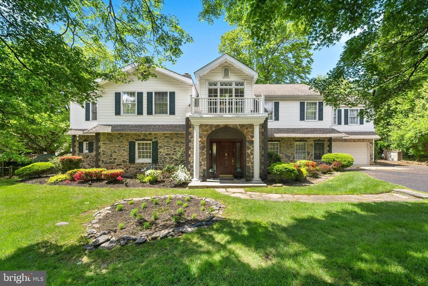 Welcome to this charming and picturesque home located in the heart of Penn Valley. From the moment you set your eyes on this beautiful home, you will be captivated by its lovely curb appeal and classic architecture. Nestled on a lovely street, this home exudes warmth and character that will make you feel right at home. With its beautiful stone exterior, lush landscaping, and inviting front entrance, this property offers the perfect blend of historic charm and modern amenities. As you step inside, you will be greeted by a warm and welcoming atmosphere that is perfect for both relaxing and entertaining. This home truly embodies the best of both worlds - a timeless aesthetic and all the comforts of modern living. As you enter through the front door, you are greeted with a grand two-story foyer featuring a luxurious marble floor. To your left, you will find a spacious formal living room with hardwood floors and a cozy wood-burning fireplace, perfect for entertaining guests. The first floor also features a full bathroom, convenient office space, and two bedrooms, one of which has its own ensuite bathroom. Moving on to the formal dining room, French doors open to a family room and a well-appointed kitchen. The kitchen is complete with an island, stainless appliances, plenty of cabinetry and a charming breakfast room. Access to the two-car garage is conveniently located in the kitchen area. French doors from the kitchen lead out to a stunning flagstone patio and the pool area with new built in hot tub, where you can enjoy the lush surroundings and a large yard, creating your own private oasis. As you make your way up to the second floor, you will find hardwood floors and three large ensuite bedrooms, each with its own full bathroom. The primary bedroom is private and features two large walk-closets. The lower level is finished and features a game room and a playroom that walks out to the pool area, making for easy indoor/outdoor living. Laundry facilities are also in the basement, along with a powder room. In total, this magnificent home boasts 6 bedrooms, 5 full bathrooms, and 1 powder room. This Stone Colonial home is a rare gem, blending classic style with modern comfort and convenience. Do not miss your chance to make this your dream home.