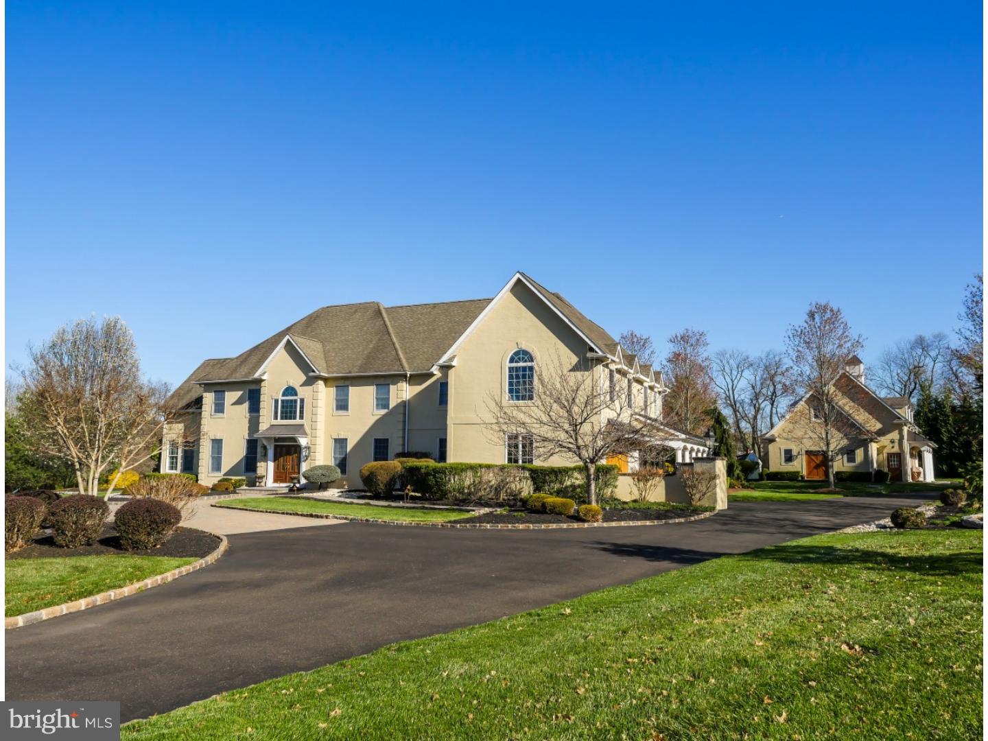 5 bedroom home with swimming pool, tennis court, finished lower level and carriage house in Bowmans Tower Farm. Overly spacious rooms, amazing views and a spectacular outdoor entertaining and living space. The governors driveway and beautiful landscaping lead to the covered leaded glass entry with a 2-story foyer with extensive architectural trim work. A large dining room with arched entry to the kitchen. Bright, with a neutral color tone the formal living room has recessed lighting. Inviting you and the outdoors in, the tiled sunroom boasts a corner fireplace and speaker system and a full bar with wine rack. With a comfy window seat flanked by striking custom built-ins and accent light this space could be an office or library and has a divided glass door leading to the great room. A full wall of stacked windows and the floor to ceiling fireplace, the great room is a space of grandeur perfect for entertaining and daily enjoyment. Enhanced with recessed lighting, pillars and arches the breakfast room boasts a skylight and the amazing backyard views. A beverage center with wine cooler and refrigerator drawers for grab and go drinks, two islands with barstool seating. Other highlights include subzero fridge, Dacar double oven, gleaming granite, tiled backsplash, and an abundance of beautiful cherry cabinetry. Exposed beams and two walls of built-ins, in addition to sliders to the patio give this versatile space options for a den, second office, or guest quarters as there is also a private full bath. Upstairs the master suite has a large sitting room and an opulent master bath with vaulted ceiling, 2 skylights, his and her vanities, a jetted-tub and a glass shower enclosure. Massive walk-in closet with dressing area. There are 4 additional bedrooms sharing two jack-and-jill style bathrooms. Each generously sized room has plenty of closet space. Lower level includes a theater room, game room with adjoining bar area, ad'l open space for recreation, lots of extra storage and a full bath. Carriage house with a large open living area with full kitchen, spacious bedroom and large bath. along with a private covered patio. Outdoor living space including a built-in grill, bar, and a fountain. Stonewalls leads to the pool area with large deck and privacy hedge. Tennis and basketball court. This home has over 3 acres and is in the top rated Council Rock School District. Truly a must see, call today to schedule your personal tour.