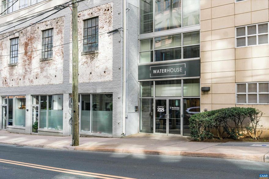 An incredible opportunity to own one of the largest condominiums in the City and directly across from the Historic Downtown Mall. This condominium was previously used as office space (32 offices). It could easily be converted to an amazing condominium or subdivided into 3 separate units. The main level consists of 7815 sqft with floor to ceiling windows (two story) providing an incredible amount of natural light. Upstairs consist of about 4300sqft and would make a perfect theater room, gym, extra bedrooms etc.  The location is ideal. Walk to everything the City has to offer. There are 5 parking spaces in the garage that convey with elevator.