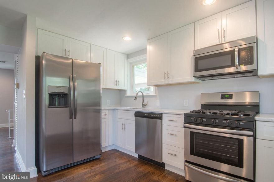 OPEN HOUSE - SUNDAY DECEMBER 7, 12:00-1:30 PM. Welcome to this beautifully updated home in the heart of Greenspring, offering the perfect blend of charm, comfort, and modern convenience. This spacious residence features bright, open living areas, warm wood flooring, and thoughtful updates throughout. The main level includes a warm and inviting living room, an elegant dining area, and a renovated kitchen with quality finishes — ideal for both everyday living and entertaining. Upstairs you’ll find generously sized bedrooms with excellent natural light and a well-appointed bath. The finished lower level has large family room and flexible space for a guest suite, home office or gym.  Step outside to a private backyard that’s perfect for relaxing, grilling, or play. Located just minutes from the Mount Washington Village, The Quarry, walking trails, top-rated schools, and major commuter routes — this home offers convenience and lifestyle in one of Baltimore’s most desirable neighborhoods. Move-in ready and full of character — COME SEE why 2436 Smith Ave should be your next home!