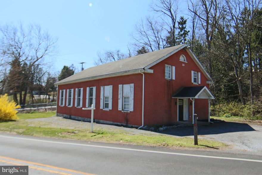Lower Swatara Township 1873 Mennonite Church that has been used as a residence with massive 32’ x 30’ open great room with 12-foot ceilings, large wood windows, wide windowsills, and original exterior wooden window shutters. This home has withstood the test of time and is still going strong. Perfect home for a live in art studio or residence where you can host a large Christmas tree. Eat-in kitchen, living room with LVP flooring, half bath with utility sink, small temporary kitchenette, furnace room and three other smaller rooms that can serve as a study, bedroom, or storage. Bring your imagination and create your own floor plan with endless possibilities. Refurbished upper level with bathroom suite, laundry, tile tub/shower with glass door, two vanities and LVP flooring. Existing duct work that can accommodate central air, 200 Amp electric box with circuit breaker plus an additional 100-amp sub panel in mechanical room. Natural gas available. Lots of parking. Located within minutes of Penn State Capital Campus, HIA and Rt 283.