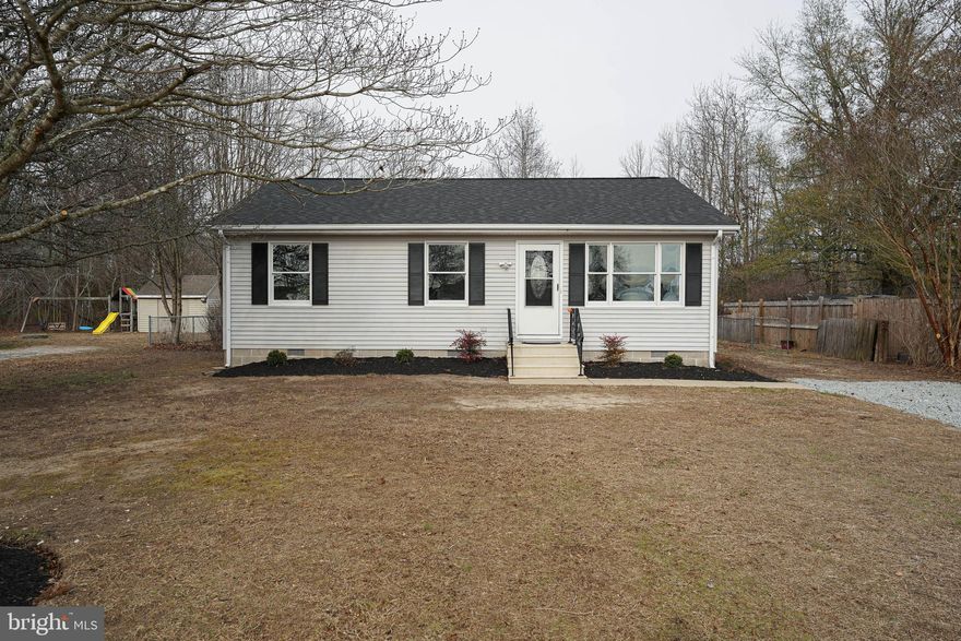 Updated and upgraded - Turn-key 3BR/1BA rancher in an incredible location! * * * Just 15mi to W Ocean City, 10mi to Berlin, 14mi to Salisbury - in an area eligible for 100% USDA financing! * * * New architectural-shingle roof, new granite counters in the kitchen and bath, new paint, new landscaping, new LVP flooring throughout the wide-open living, dining, and kitchen areas; new carpet in the bedrooms.  Bright and cheery living room with triple windows opens up into the kitchen and dining area. 3 nice-sized bedroom. Full bath w/tub/shower combo, new LVP flooring, new granite countertop. The work is done - move right in and enjoy your new home! Multi-level deck overlooks your roomy .36 acre lot w/fenced rear yard on a no-through street, nearby public parks, and the conveniences of city services. Sizes, taxes approximate