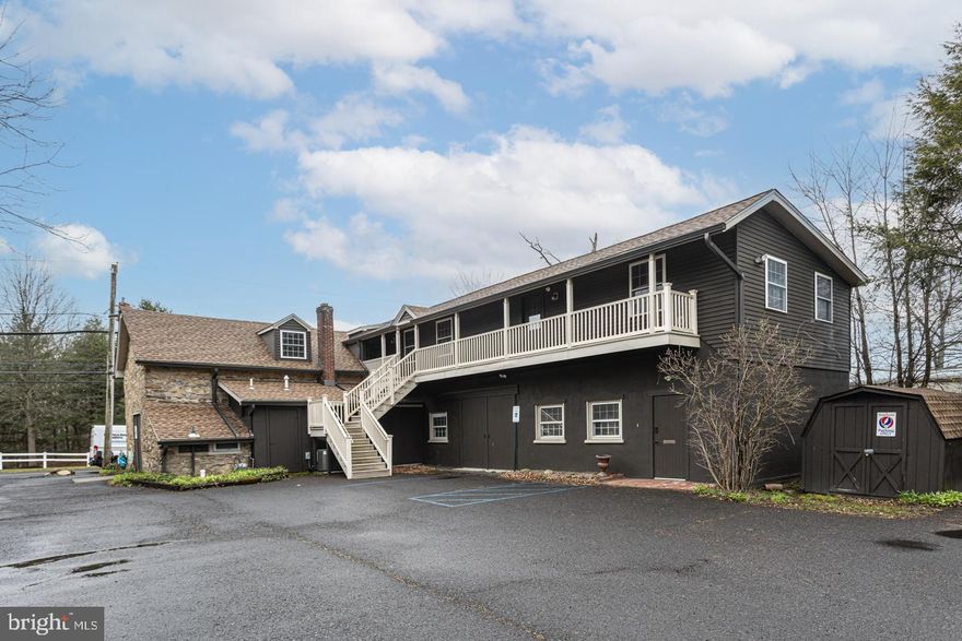 Historic office building featuring approx  4,000 s.f. on first floor and second floor for lease.  This VC-2 zoned 1850's building has been lovingly restored with modern amenities including LED lighting and CAT 5 wiring throughout.  Space offers a half bathroom with a kitchen with beverage refrigerator on the second floor. The energy-efficient space offers zoned heating & cooling with Honeywell T6 WiFi enabled thermostats and skylights for passive heating.  An expansive rear yard is ideal for outdoor activities or lunch.  A new roof, wood floors, freshly painted both inside and out, and parking for over 10 cars, round out this super chill workspace in beautiful Buckingham Township.  Tremendous opportunity and outstanding location.