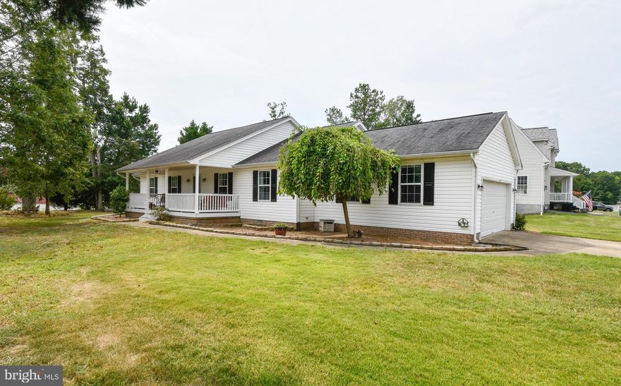 Close to the main entrance to Dahlgren, Walmart, Shopping and the Harry Nice Bridge make this home a commuting dream. Featuring a rocking chair front porch. open floor plan and so much more. Welcome your guest into the large family room with vaulted ceilings . Large open kitchen with breakfast nook for dining.  Primary bedroom with ensuite bath. 2 generous sized bedrooms and hall bath round out the main floor. Home features solar panels for saving on your electric bill and is wired for a whole house generator. There is a fenced  backyard  and shed for added storage. A oversized 2 garage garage checks off your must have list. Convenient location, great condition, energy saving solar and 2 car garage make this a must see.