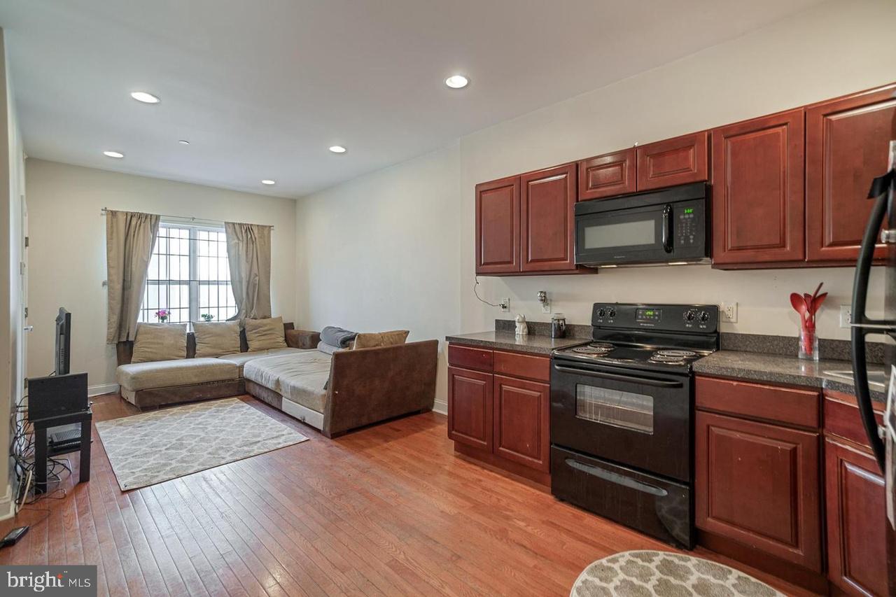 Well-maintained, spacious 7 bed, 4 full bath duplex located just a walk from the heart of Temple University Campus! This Duplex was built in 2009 and has it all central air, beautiful hardwood floors, recessed lighting, cherry-finished cabinets, separate utilities, washer and dryer in each unit, security system, sprinkler system, separate keys plus master key, and plenty of living space. Bedrooms include ceiling fans, closets, windows, and carpeting. Unit 1 features 3 bedrooms and 2 full baths, finished basement with storage area, and a private fenced-in rear patio. Unit 2 features 4 bedrooms and 2 full baths, large rooms throughout, and convenient roof access from 3rd floor. Historically, both units have been 100% occupied with no vacancies. Schedule your tour today!