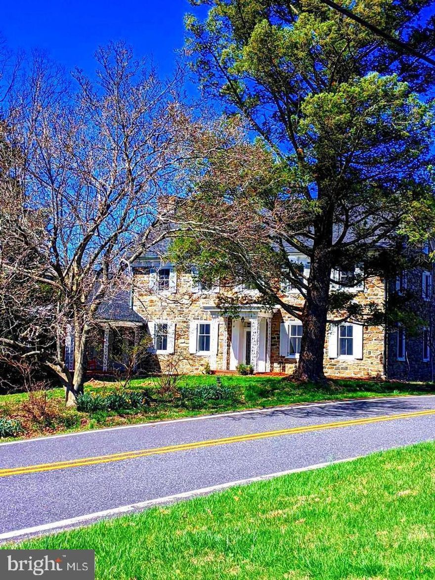 Plan your future by securing this 103 plus acre magnificient farm/homestead! A storybook scene of nature at its best. Easily accessible to the essential services of shops, schools , restaurants, wineries. Daydreaming comes naturally in this place you could call home! Irresistible stone farmhouse features six bedrooms, four full baths, one half bath, all tiled. Wood fireplace, hardwood flooring, new carpeting, new windows throughout the home, new roof. Multiple outbuildings, two ponds, many crop farming acres, in-ground Roman style pool. Enjoy eating fresh peaches and cherries growing in abundance from the orchards. House boasts lots of room for a Bed and Breakfast, Air B n B, special events. Tons of possibilities! Ever dream of owning your own farm? Here's the best awe-inspiring opportunity on the market! Call today!