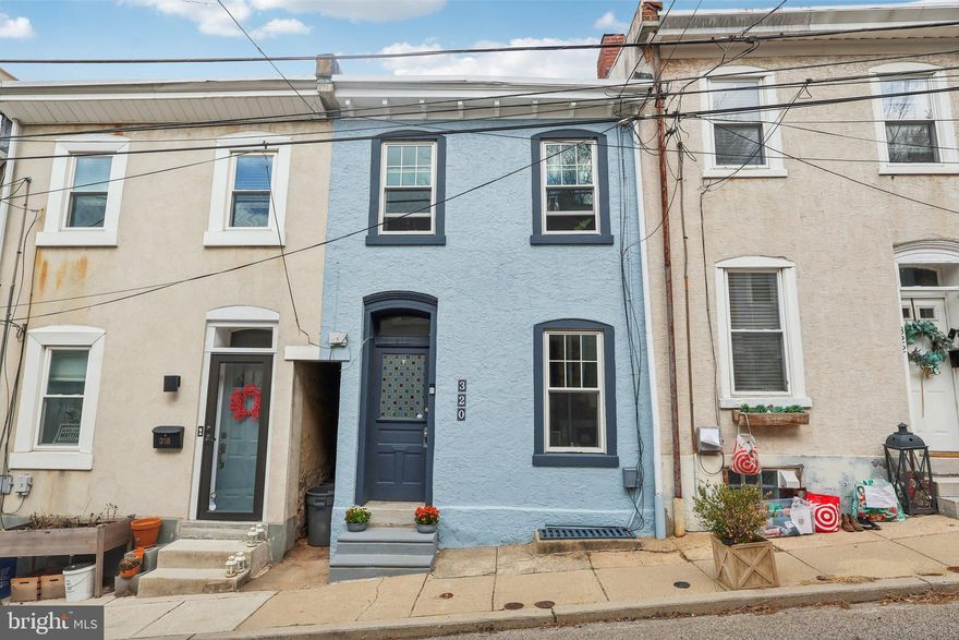 Welcome to this charming rowhome nestled on a quiet street in the heart of Roxborough boasting tons of vintage charm. With its original doors, hardwood floors, and timeless appeal, this home exudes warmth and personality. The main level features a spacious living room that flows seamlessly into the kitchen, which boasts a brand new dishwasher. Continue through the kitchen's door into your very own private, secluded backyard—an ideal retreat complete with a covered patio and a garden bed for gardening enthusiasts. A newly added alleyway door provides convenient access to the front of the home for easy street access. Upstairs, you'll find two cozy bedrooms that share an updated, zen-inspired full bathroom. This serene space includes a classic clawfoot tub, offering a perfect place to unwind after a long day. The full basement is an added bonus, offering ample space for storage, as well as a custom workbench for any DIY enthusiast. It also comes equipped with a new washer and dryer, ensuring laundry day is a breeze. Recent updates include all new windows, a new roof, and new gutters on the back of the house, ensuring peace of mind for years to come. Located just a stone’s throw from a paid parking lot, public transit, local parks, and an array of restaurants and bars, this home offers the perfect blend of convenience and charm. Don’t miss the opportunity to make this vintage gem your own!