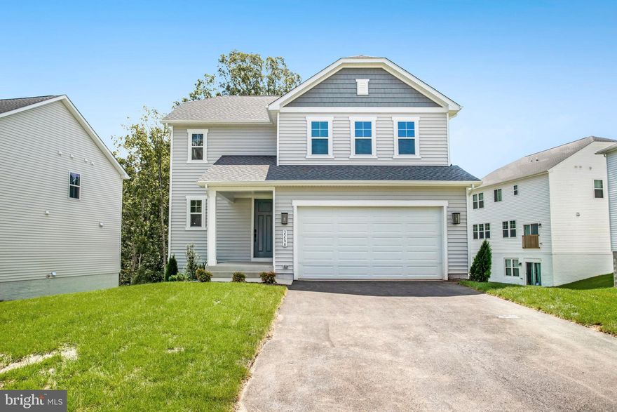 Discover this thoughtfully designed 4 Bedroom Coral home. Featuring an inviting covered entry, spacious kitchen offering pantry and a center island, an open dining area and a cozy great room. A lavish primary suite showcasing a spacious walk-in closet and a private bath, 3 bedrooms and a convenient laundry make easy living accessible. Home offers a walk-out unfinished basement with bath rough ins, a 2-car garage and 2-car driveway. Experience comfort and style. Make one yours today!