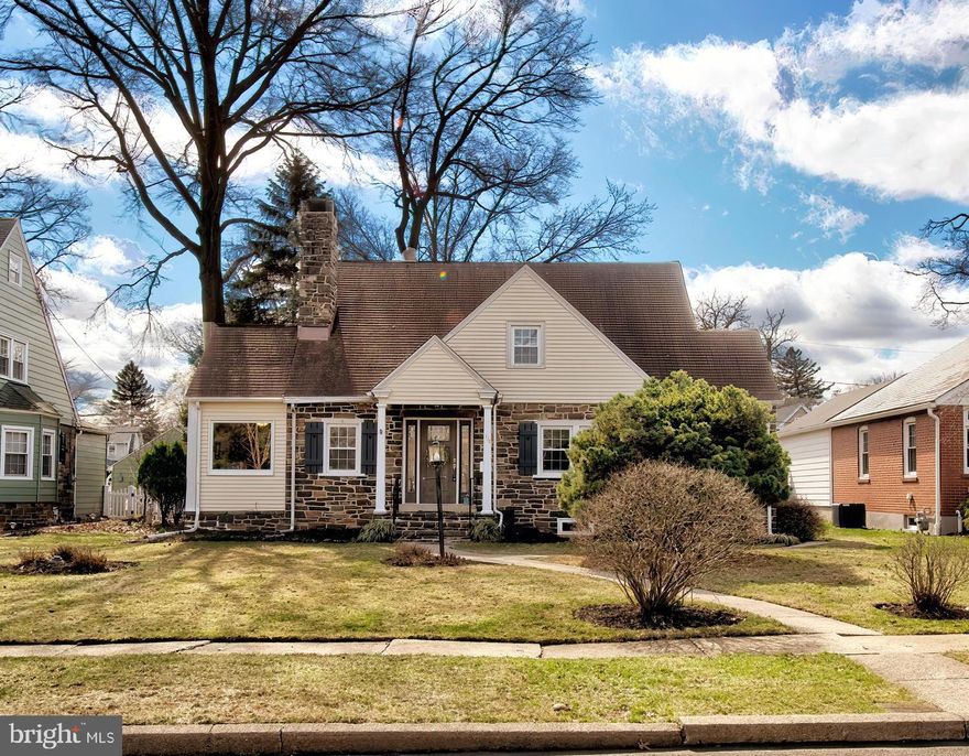 Welcome to this beautifully maintained Cape Cod offering 3 bedrooms and 2 full bathrooms in the highly desirable, tree-lined Elm Terrace neighborhood. Thoughtfully improved and meticulously cared for, this home presents a move-in-ready opportunity for today’s buyer.
Enter through the newer front door featuring leaded glass with matching sidelights, setting the tone for the character and charm found throughout. The open flow between the kitchen and living room creates an inviting first impression.
The living room is warm and welcoming, featuring a wood-burning fireplace, built-in bookcase, hardwood flooring, and abundant natural light. At the center of the home, the updated kitchen showcases granite countertops, 42-inch cabinetry, a handcrafted tile backsplash, under-cabinet lighting, and stainless-steel KitchenAid appliances, including a new five-burner convection range. Crown molding, a three-seat breakfast bar, and a built-in wine and glass rack add both style and functionality.
A first-floor bedroom with hardwood flooring, crown molding, chair rail, and a ceiling fan with light provides flexible living options. The full bathroom on this level has been tastefully updated. The dining room, accessed through arched openings, offers a generous space for gatherings and is enhanced by wide baseboard trim, a corner cabinet, crown molding, and chair rail.
Upstairs, a hardwood hallway leads to two additional bedrooms, one with hardwood flooring and one with carpeting, along with a full bathroom and hall storage and attic access.  
The finished lower level expands the living space and is ideal for entertaining or everyday use, complete with hardwood flooring, recessed lighting, built-in bookcases, and a dry bar.
Additional highlights include a charming stone construction, deep windowsills, vinyl replacement windows, a covered front porch, glass doorknobs, a covered side porch with keyless entry, and a spacious rear deck perfect for outdoor entertaining. A detached two-car garage with a new roof adds further value.
Major systems have been updated, including a Burnham oil boiler (2020) with Beckett burner, two-zone heating, a 230-gallon oil tank, & upgraded 100-amp electrical service. 
Conveniently located within walking distance of downtown and the 9th street train station.  Just minutes from Wegmans, Target, and BJ’s, with easy access to Routes 476, 202, and 309, this home offers the perfect combination of charm, convenience, and long-term value.
***Don't miss our exclusive website for this home, featuring a 3D Matterport tour, Virtual Reality Walkthrough, detailed floor plan, professional photography, aerial drone neighborhood footage. Note: Some photos have been digitally enhanced. ***